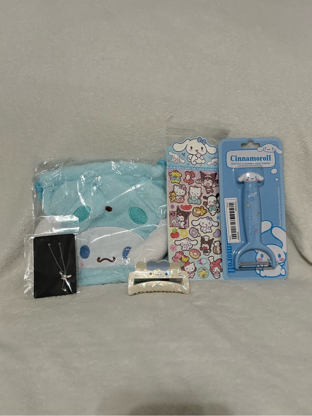 Cinnamoroll Bundle #7E - Drawstring Pouch, Peeler, Necklace, Hair Clip, Stickers